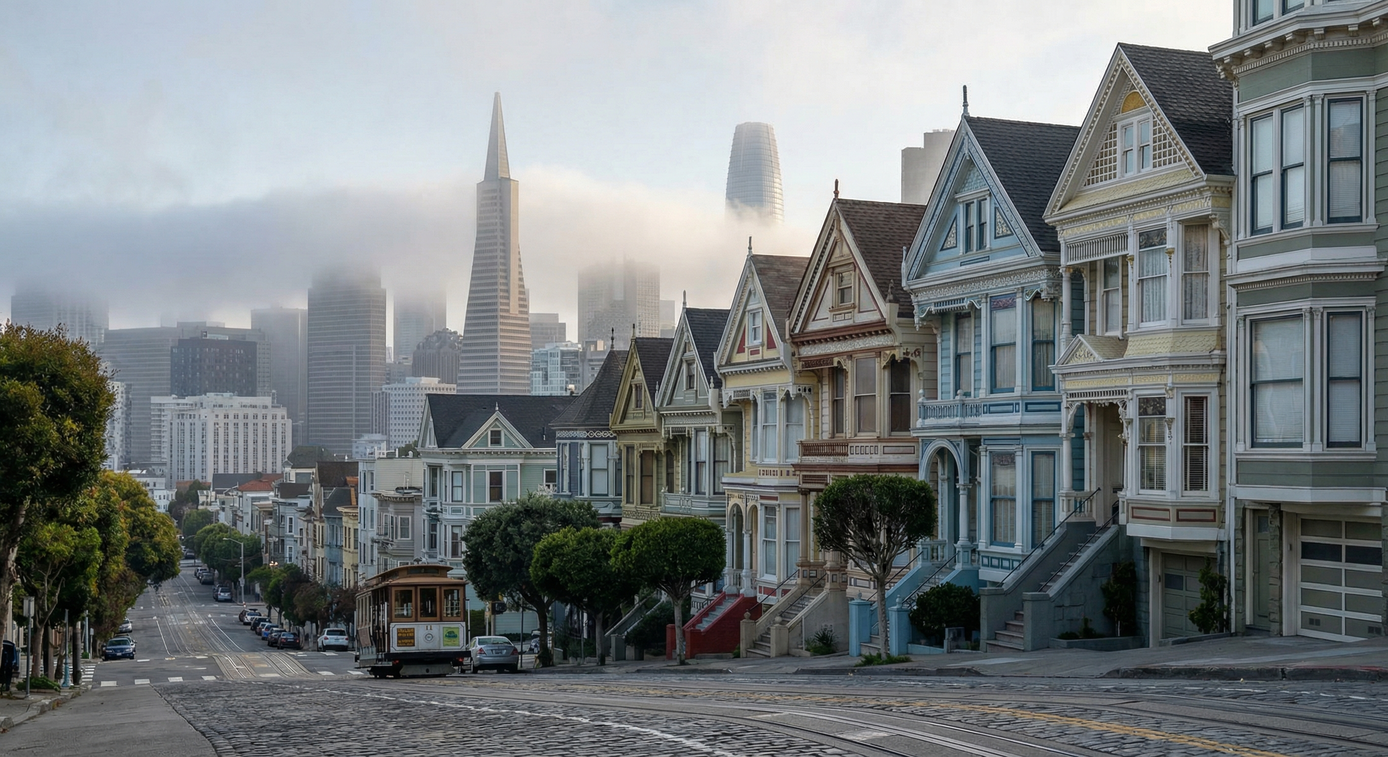 San Francisco Victorian houses with downtown skyline representing the city's housing crisis driven by rent control
